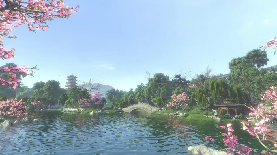 春日中式园林湖景，粉花枝探入前景，湖面泛柔波，岸畔有石拱桥、古亭与绿树，远处有古塔楼。