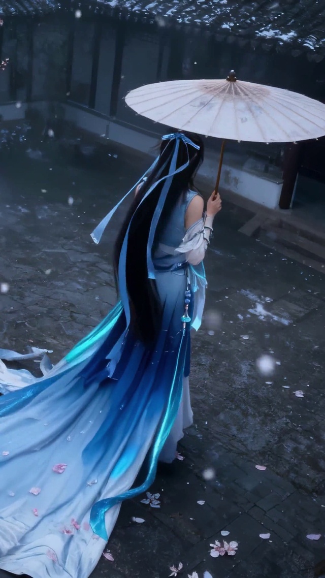 落樱雪天古风撑伞美人